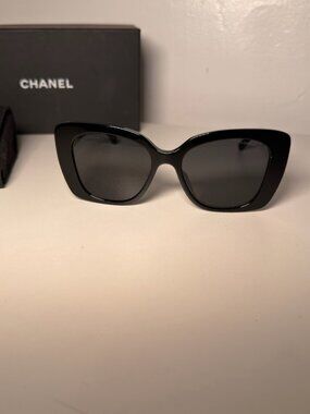 CHANEL Black Sunglasses with White Logo